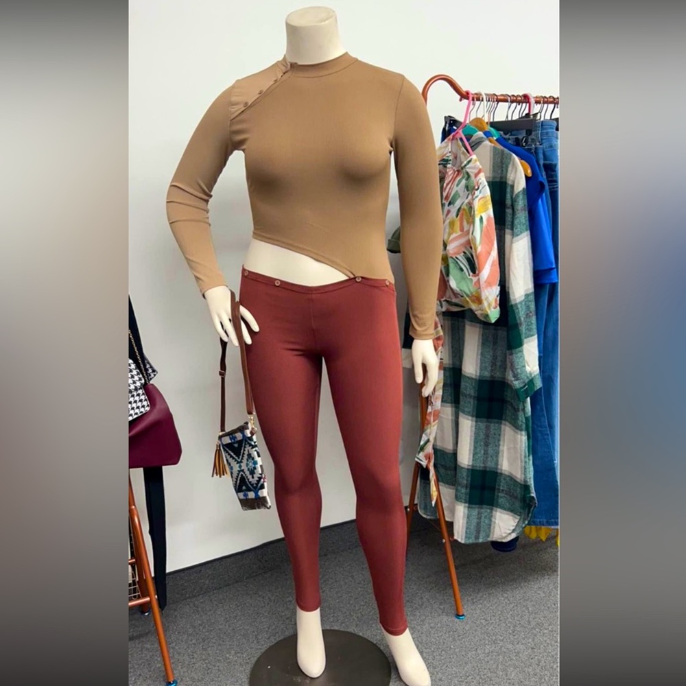 Body suit with cut out